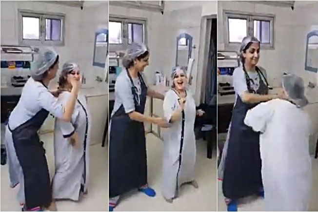 pregnant woman, dancing with her doctor, before woman delivery, before the surgery 