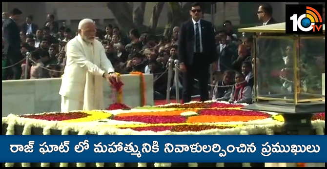 Prime Minister Narendra Modi and Vice-President M Venkaiah Naidu pay tribute to MahatmaGandhi at Rajghat