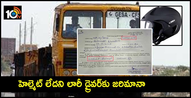 Truck driver fined by traffic police for not wearing helmet