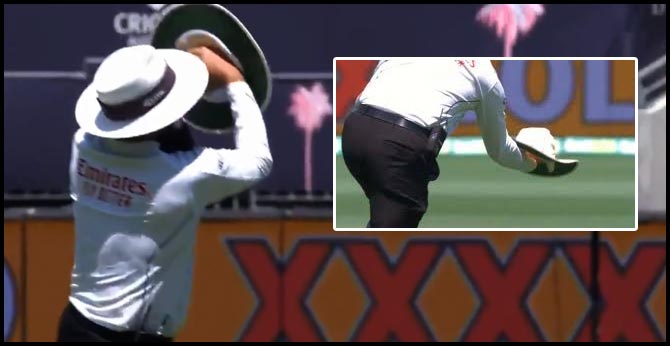 ‘Neat hat trick’: Video of umpire Aleem Dar catching flying hat