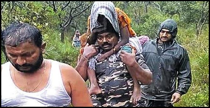 Kadapa cop carries old woman on shoulders for 4km