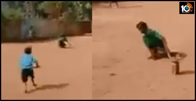 physically challenged kid playing gully cricket