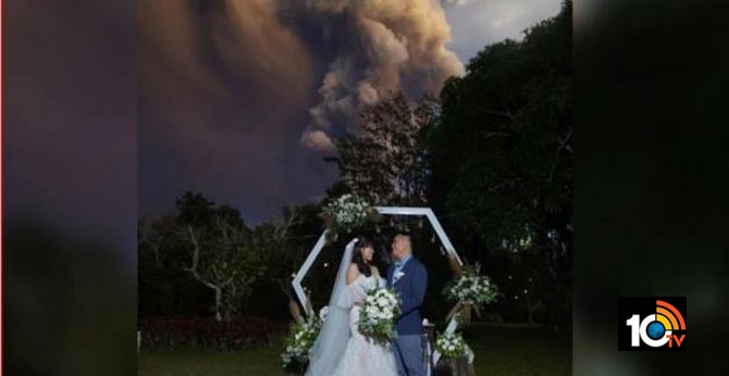 Couple Continues With Wedding As Philippines.. Taal Volcano Spews Ash Into Air