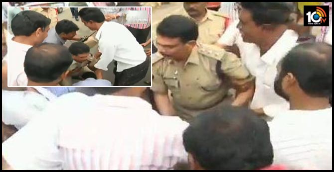 Protesters fell at feet of Deputy Superintendent of Police(DSP) Veera Reddy, who in turn fell at the feet of protesters in Mandadam in Amravati district.