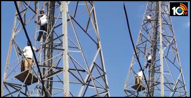 four persons climb cell tower in amaravati