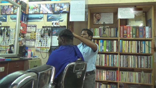 TN hair saloon cum library offers services at discount rates to readers