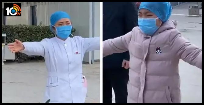 heartbreaking video: Chinese nurse in coronavirus hit hospital gives her sobbing daughter "air hug" of coronavirus effect