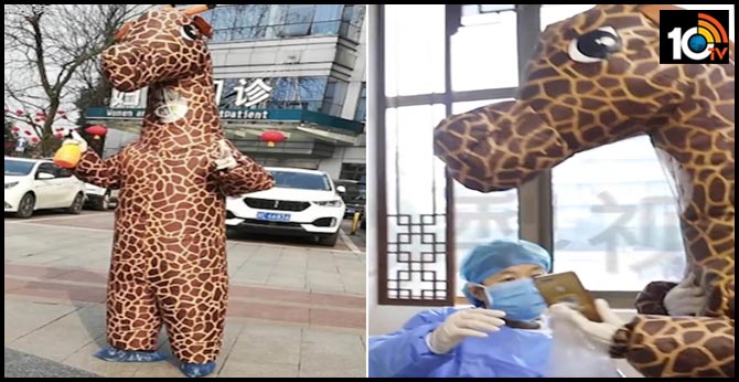 Chinese woman dons an inflated giraffe costume to hospital as a way to protect her from coronavirus after failing to buy a face mask