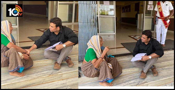bhupalpally collector talks with 70 year old woman on steps