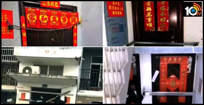 china authorities are nailing in wooden planks, locking houses with iron chains