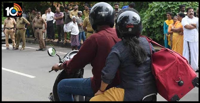 helmet must for both.. new traffic rule in hyderabad