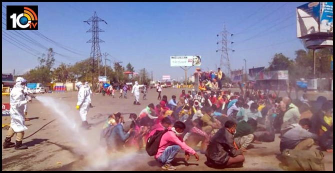 Migrant workers sprayed with disinfectant in uttar pradesh