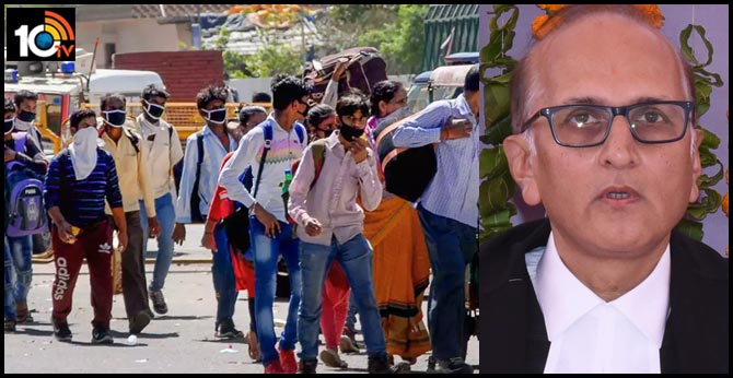 No security cover, SC’s Justice S Ravindra Bhatt hands over food to migrants on roads