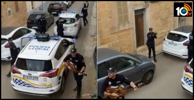 Police officers sing and dance in Spain to spread cheer during coronavirus lockdown. Viral video