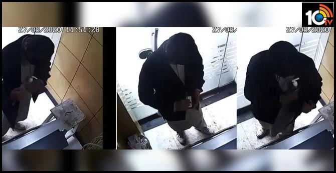 man steals sanitiser in atm center