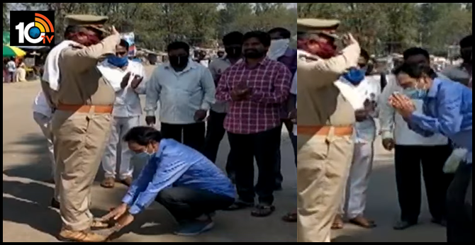 ysrcp mla touches police feet