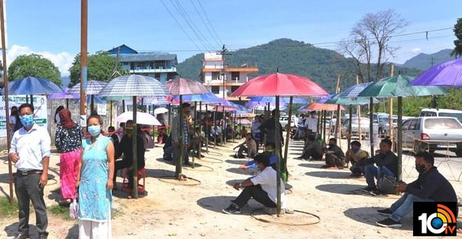 Shed of umbrellas outside West Siang