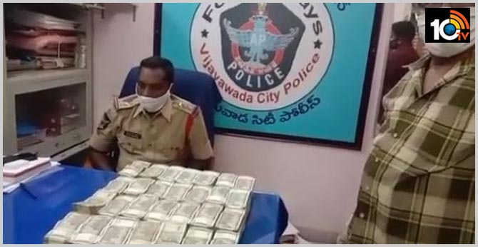 vijayawada police have seized a large amount of cash from omni van 