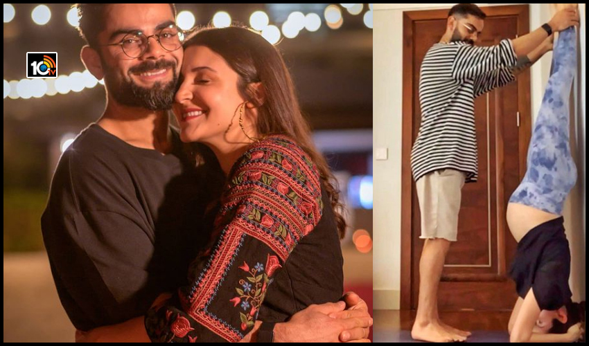 కోహ్లీ సాయంతో అనుష్క శీర్షాసనం! కోహ్లీ సాయంతో అనుష్క శీర్షాసనం!