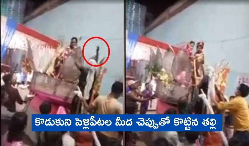 Woman Beats Groom With Slippers On Stage