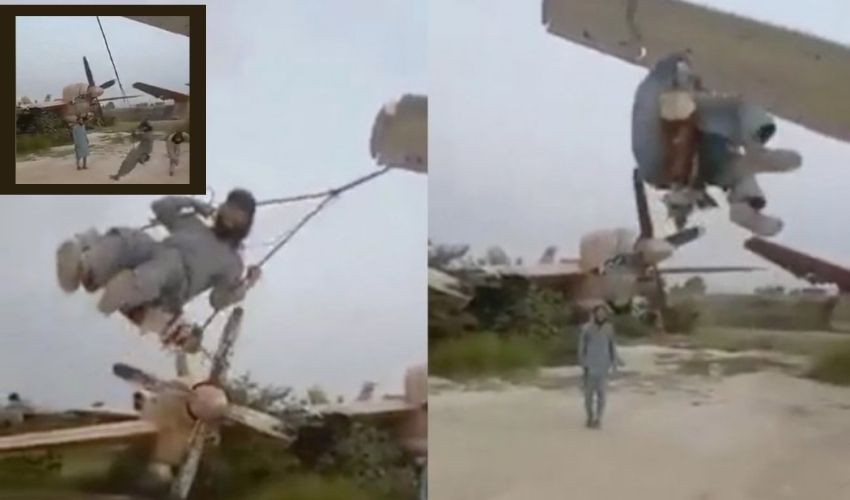 Afghan Talibans :యుద్ధ విమానం రెక్కకు ఊయల కట్టి ఊగుతున్న తాలిబన్లు Afghan Talibans :యుద్ధ విమానం రెక్కకు ఊయల కట్టి ఊగుతున్న తాలిబన్లు