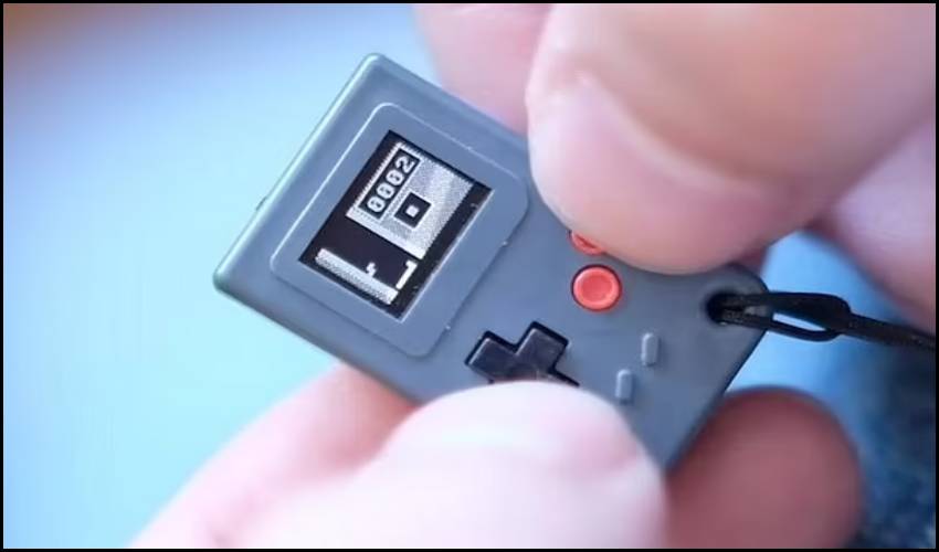 Gaming World’s Smallest Console Is The Same Size As A Postage Stamp
