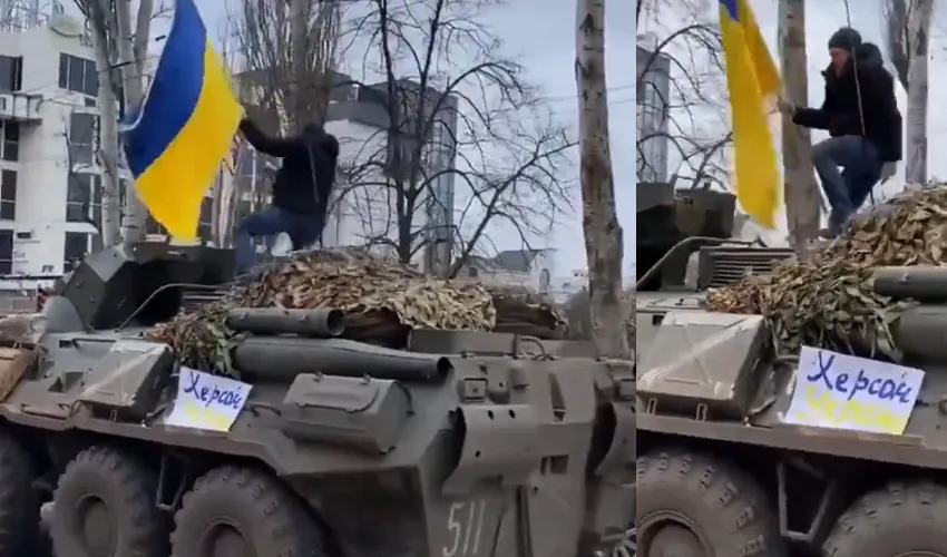 Ukrainian Flag Ukrainian Man Climbs Onto Russian Tank, Waves National Flag As Crowd Cheers