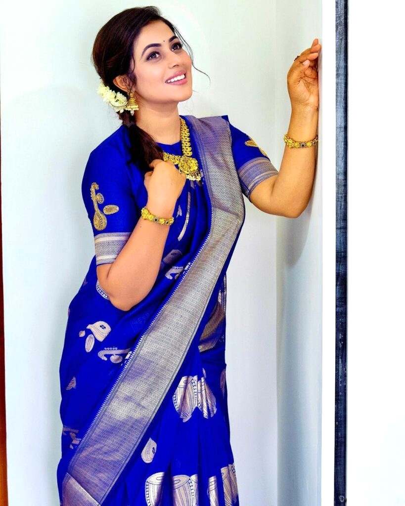 Actress Poorna Looks Stunning In Blue Saree