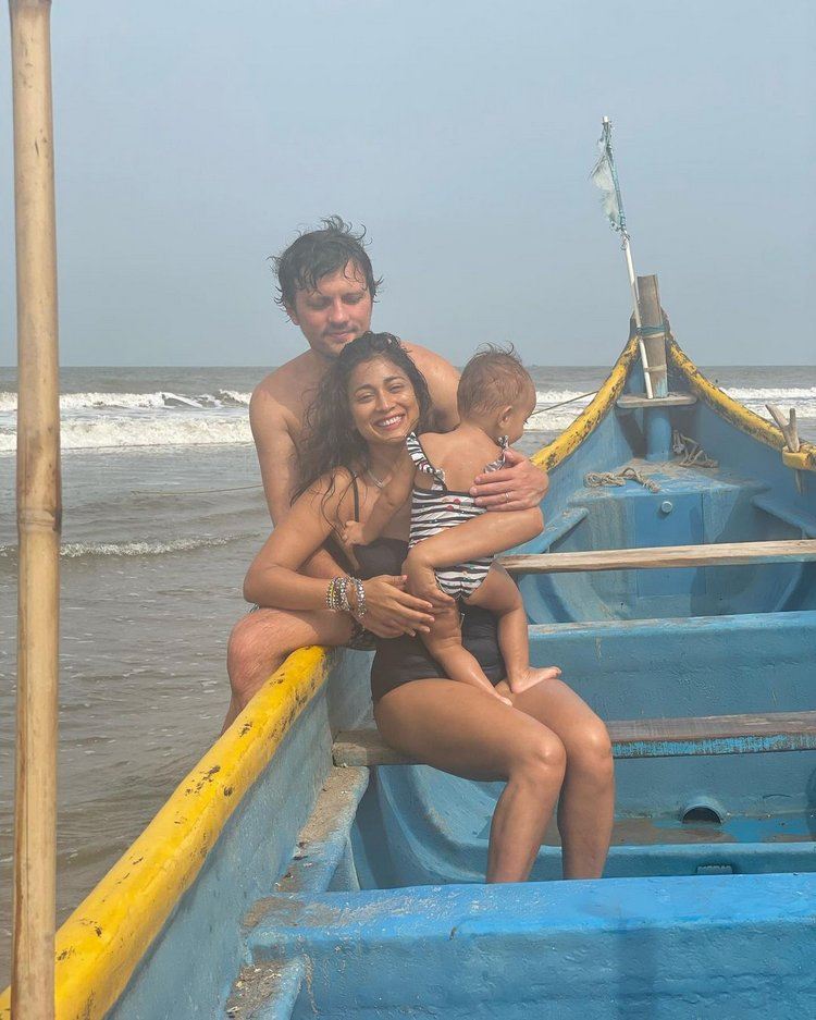 Shriya Saran Sizzling At Sea Shore With Daughter005