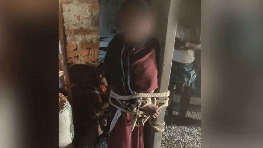 Woman Tied To Pole