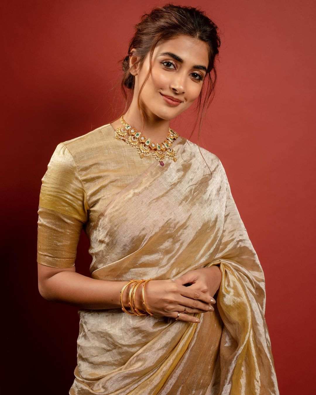 Pooja Hegde Shines In Golden Saree002