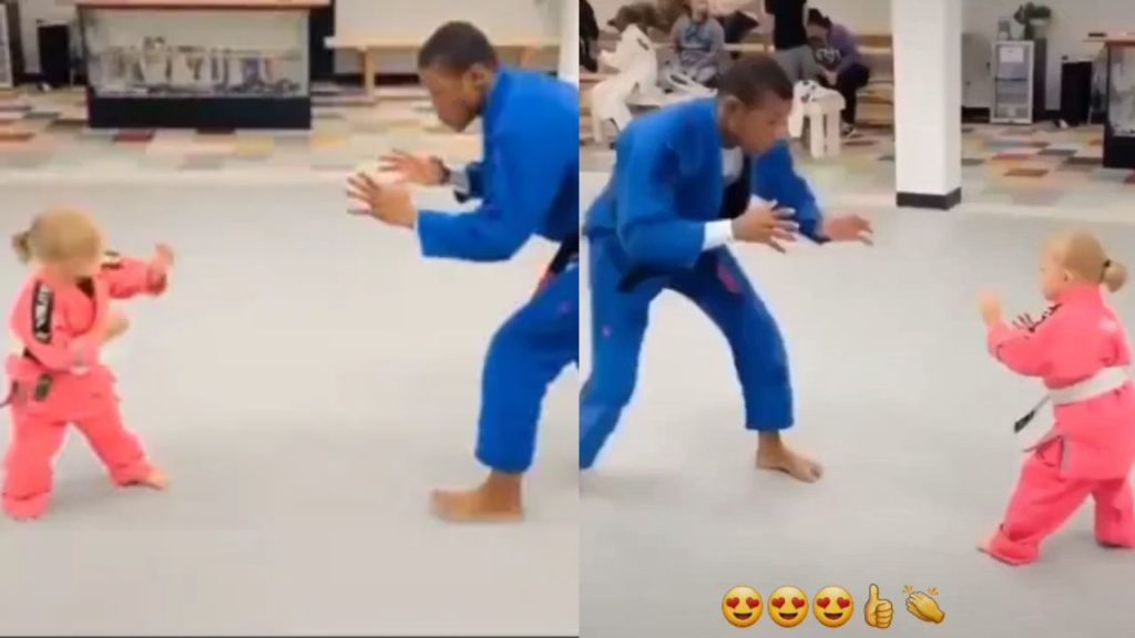 Cute baby defeating karate teacher