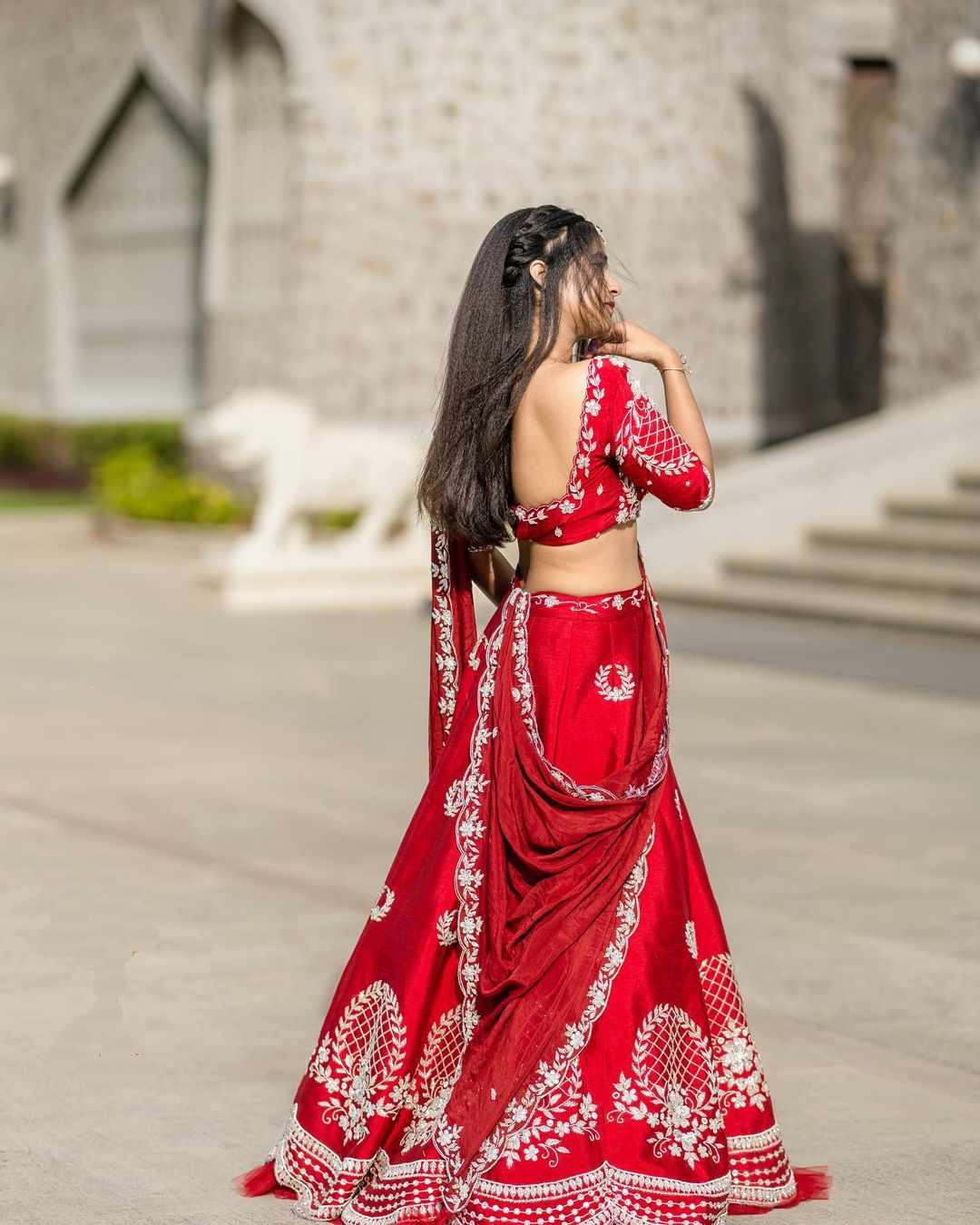 deepthi sunaina shining in red half saree 