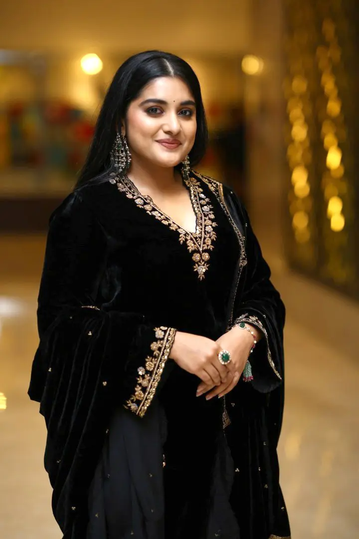 Nivetha Thomas Sizzles In Black Dress