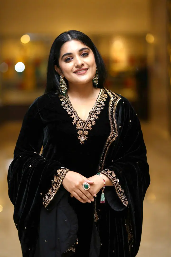 Nivetha Thomas Sizzles In Black Dress