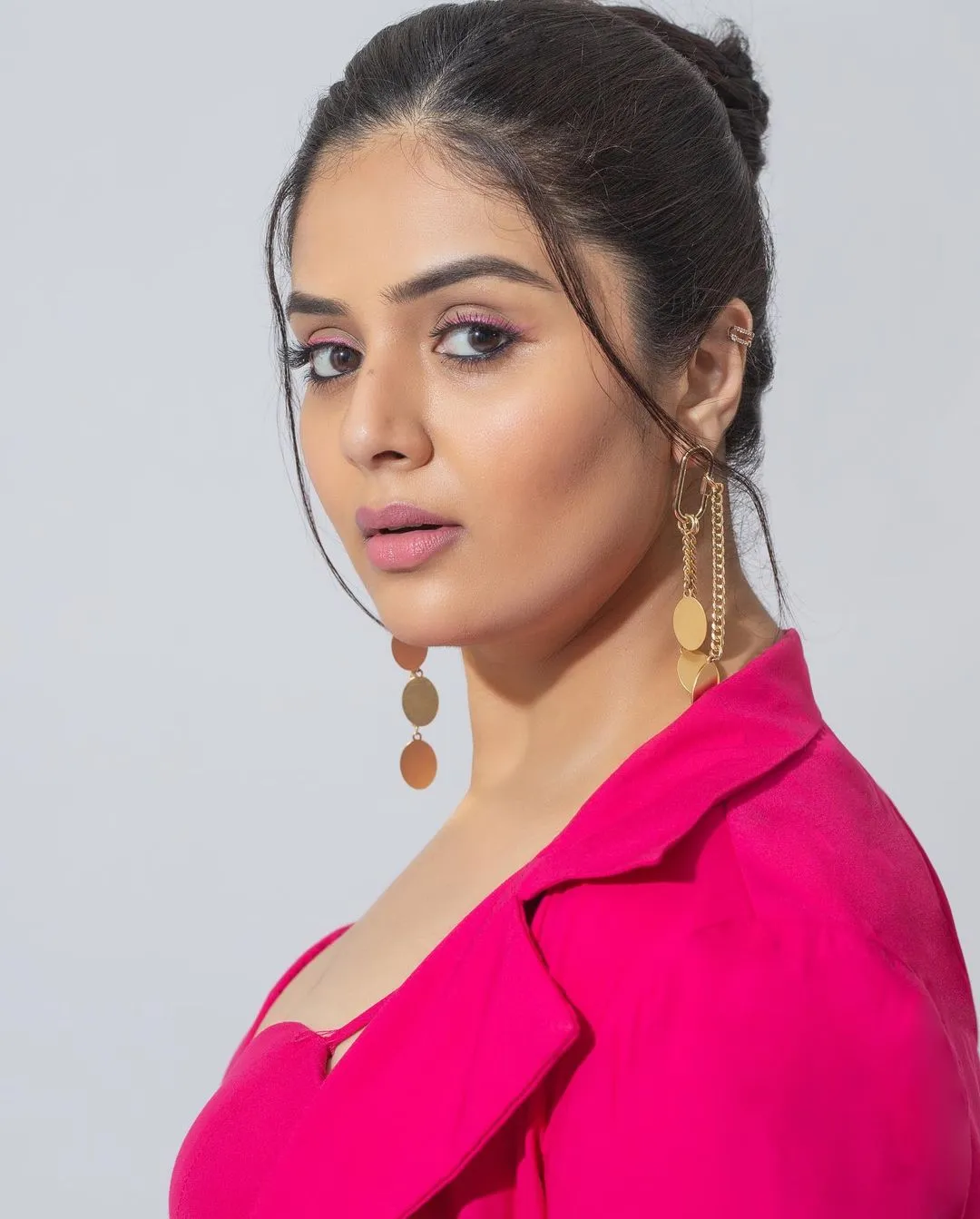 Sreemukhi Poses in Pink Dress