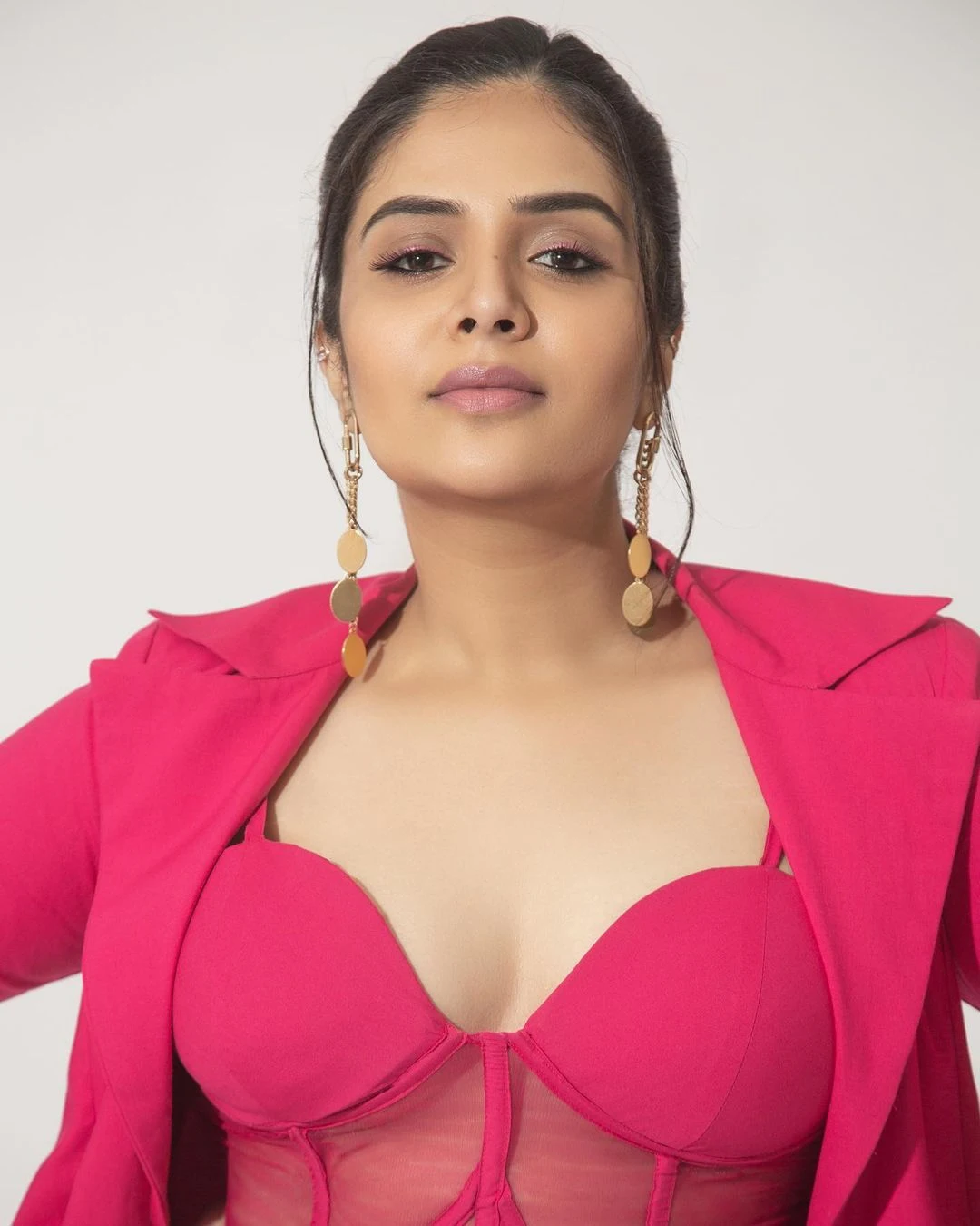 Sreemukhi Poses in Pink Dress