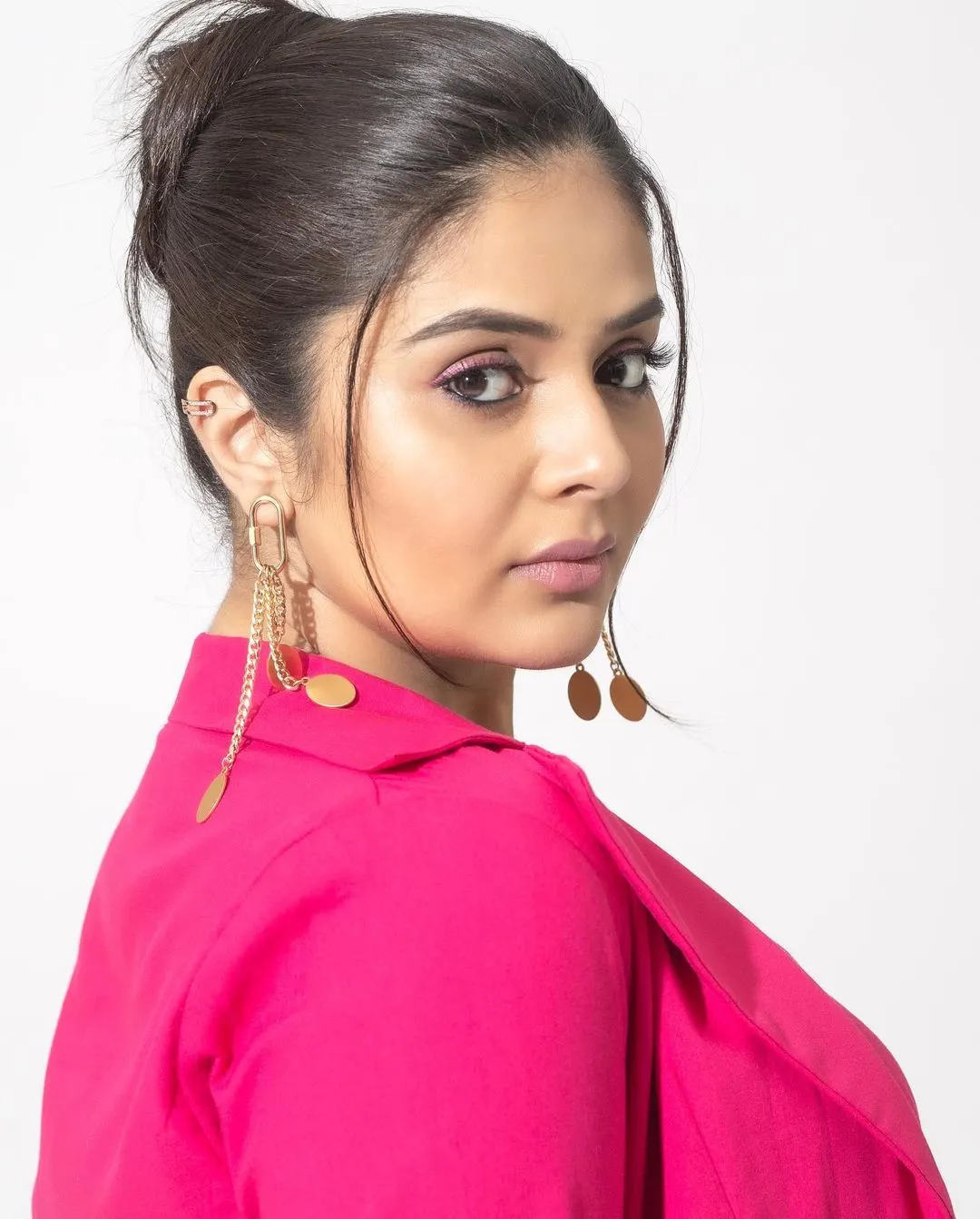 Sreemukhi Poses in Pink Dress