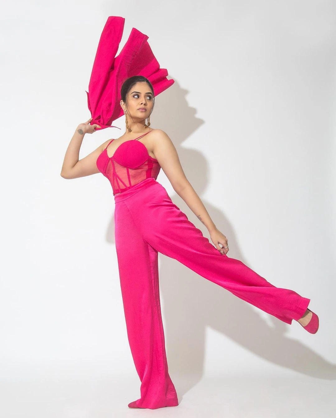Sreemukhi Poses in Pink Dress