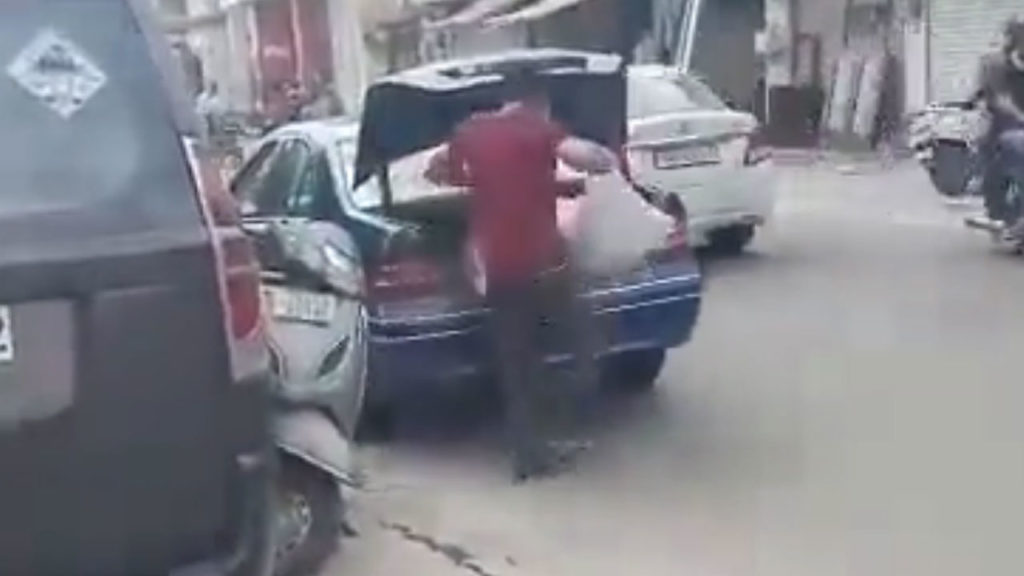 man arrives ration shop in benz car in punjab
