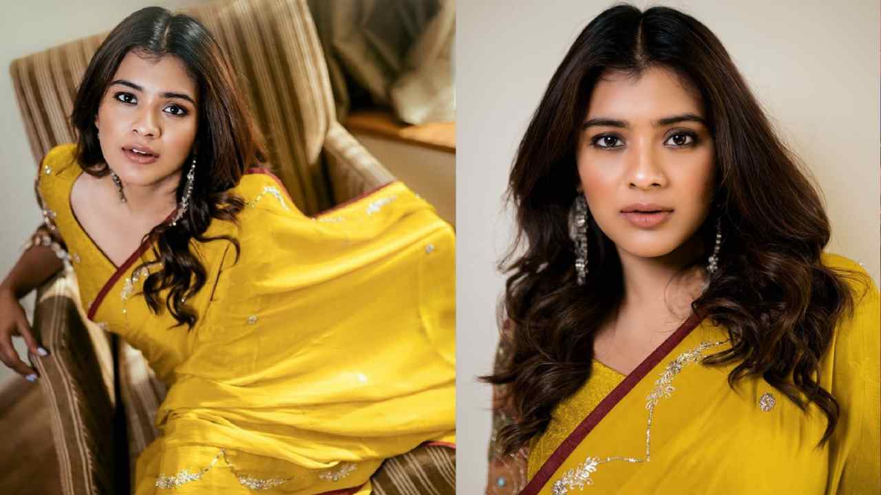 Hebah Patel Poses In Yellow Saree