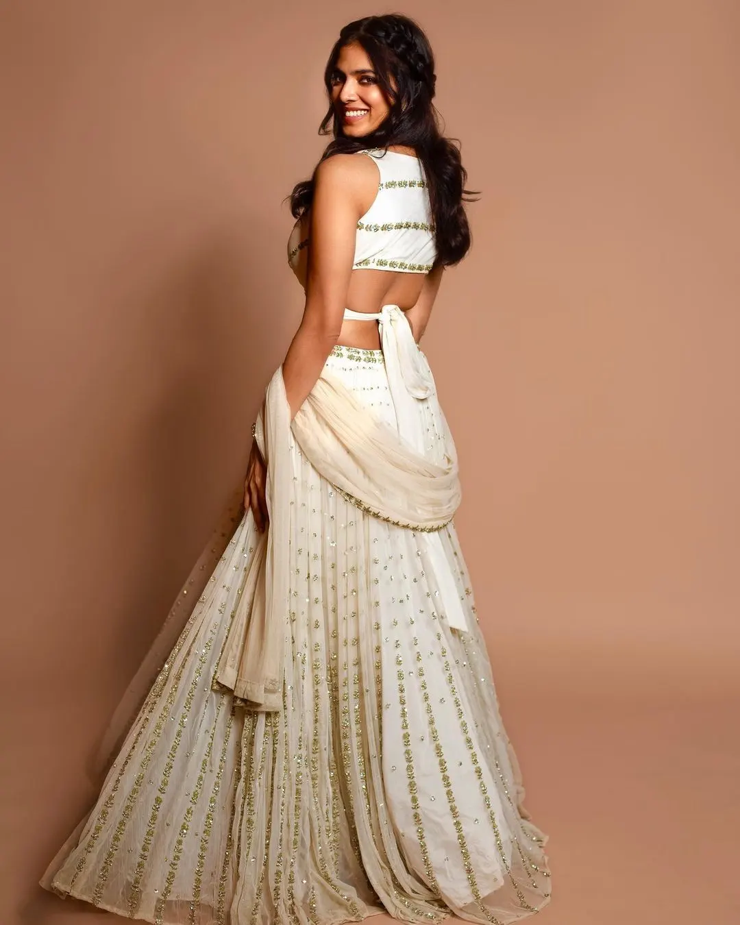 Malvika Mohanan Gorgeous Photos in White Dress