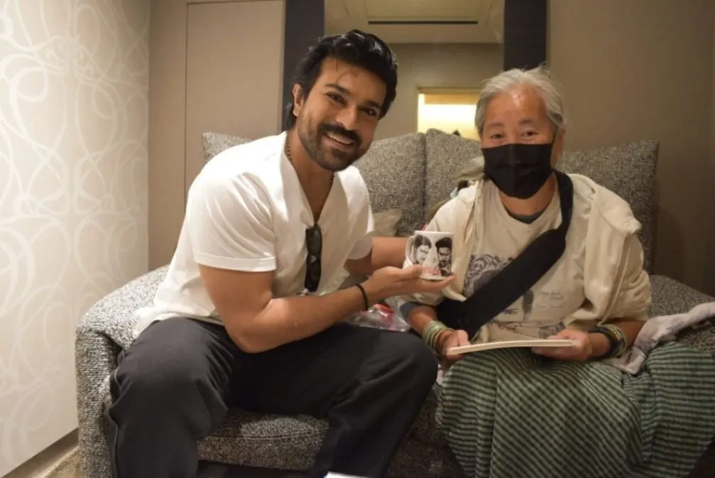 Ram Charan With his 70 years Female fan in Japan 
