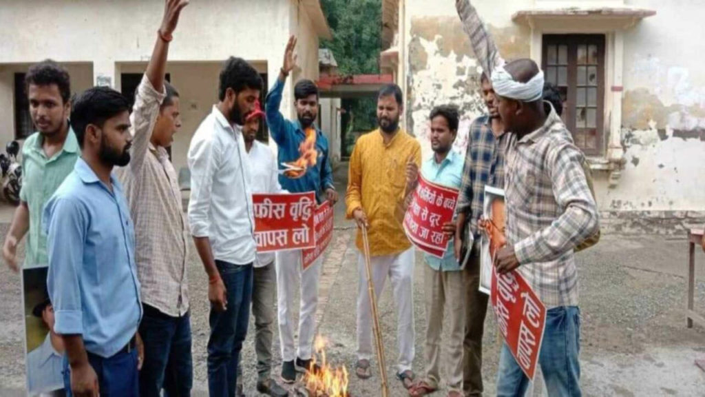 Allahabad University protesting fee hike burn effigies of PM Modi