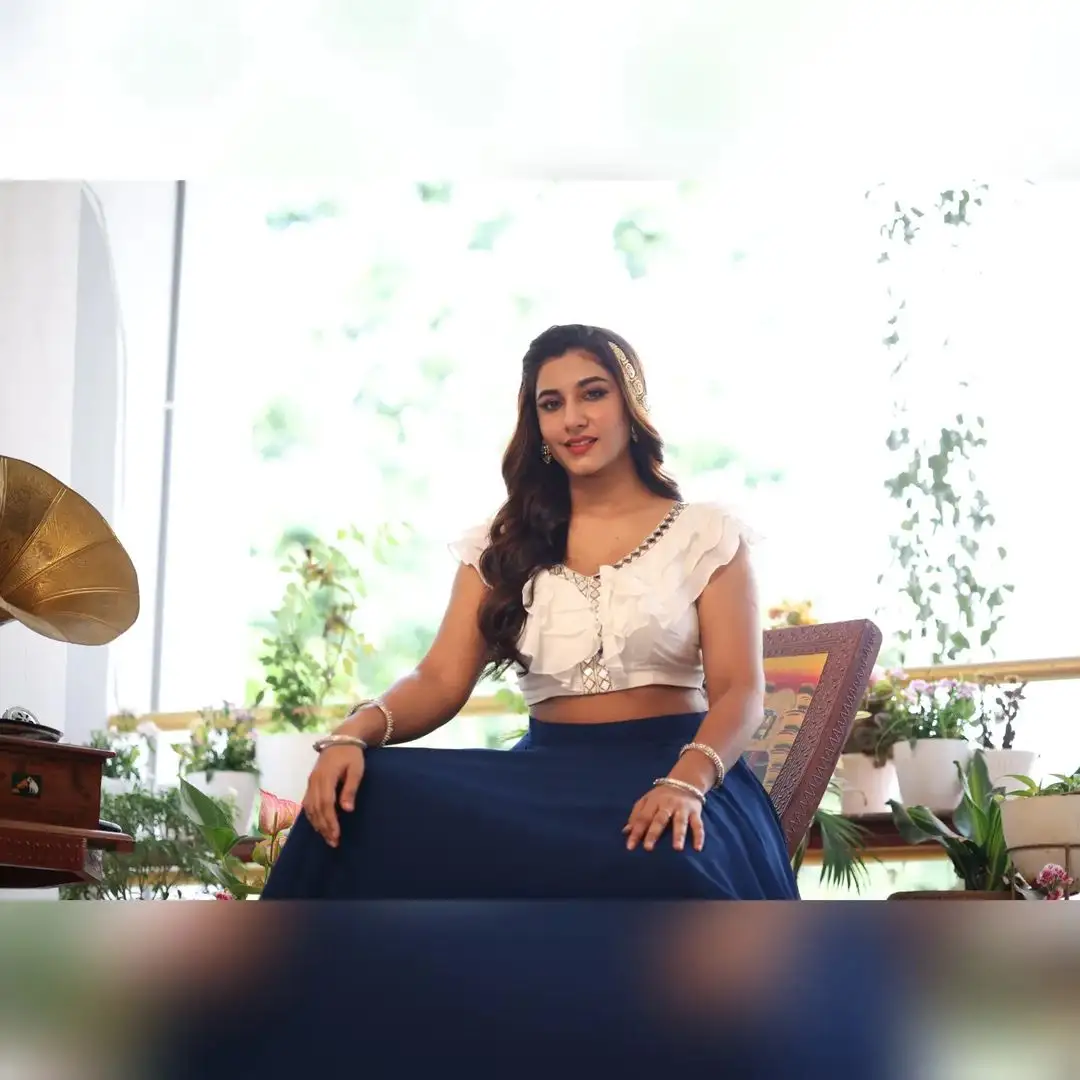 Vishnupriya bloomed in a white & blue dress