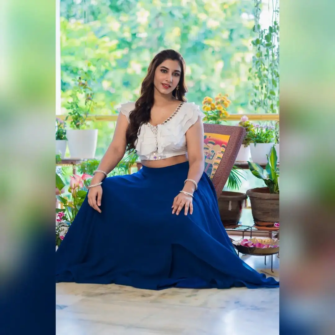 Vishnupriya bloomed in a white & blue dress
