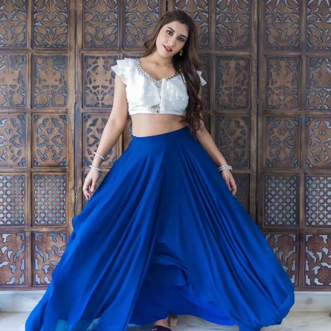 Vishnupriya bloomed in a white & blue dress