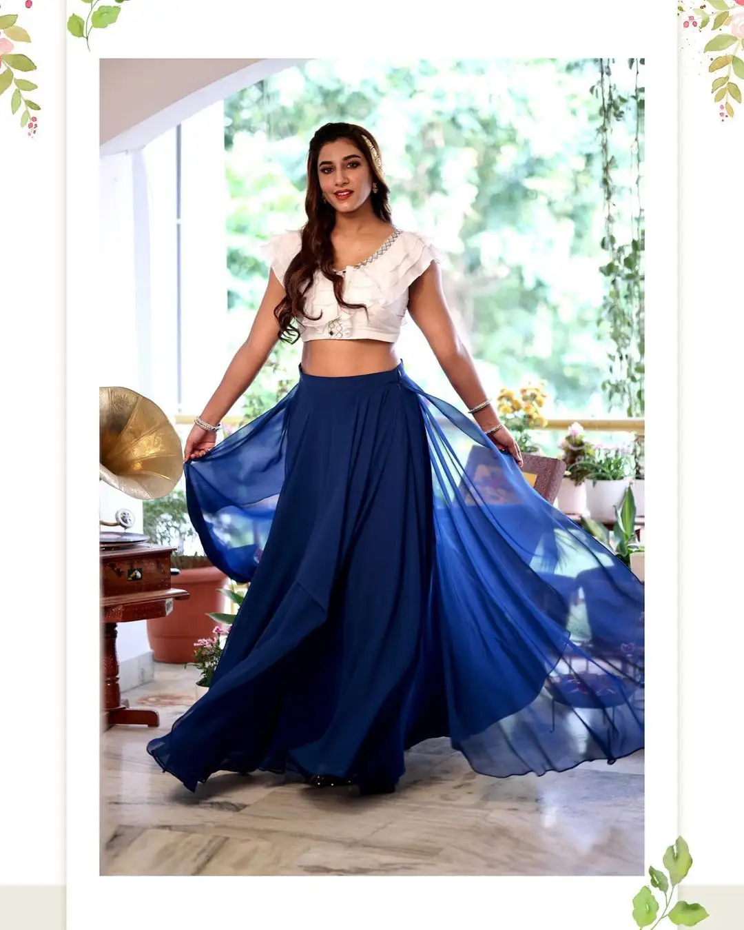 Vishnupriya bloomed in a white & blue dress