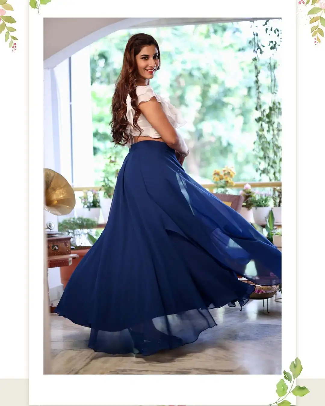 Vishnupriya bloomed in a white & blue dress