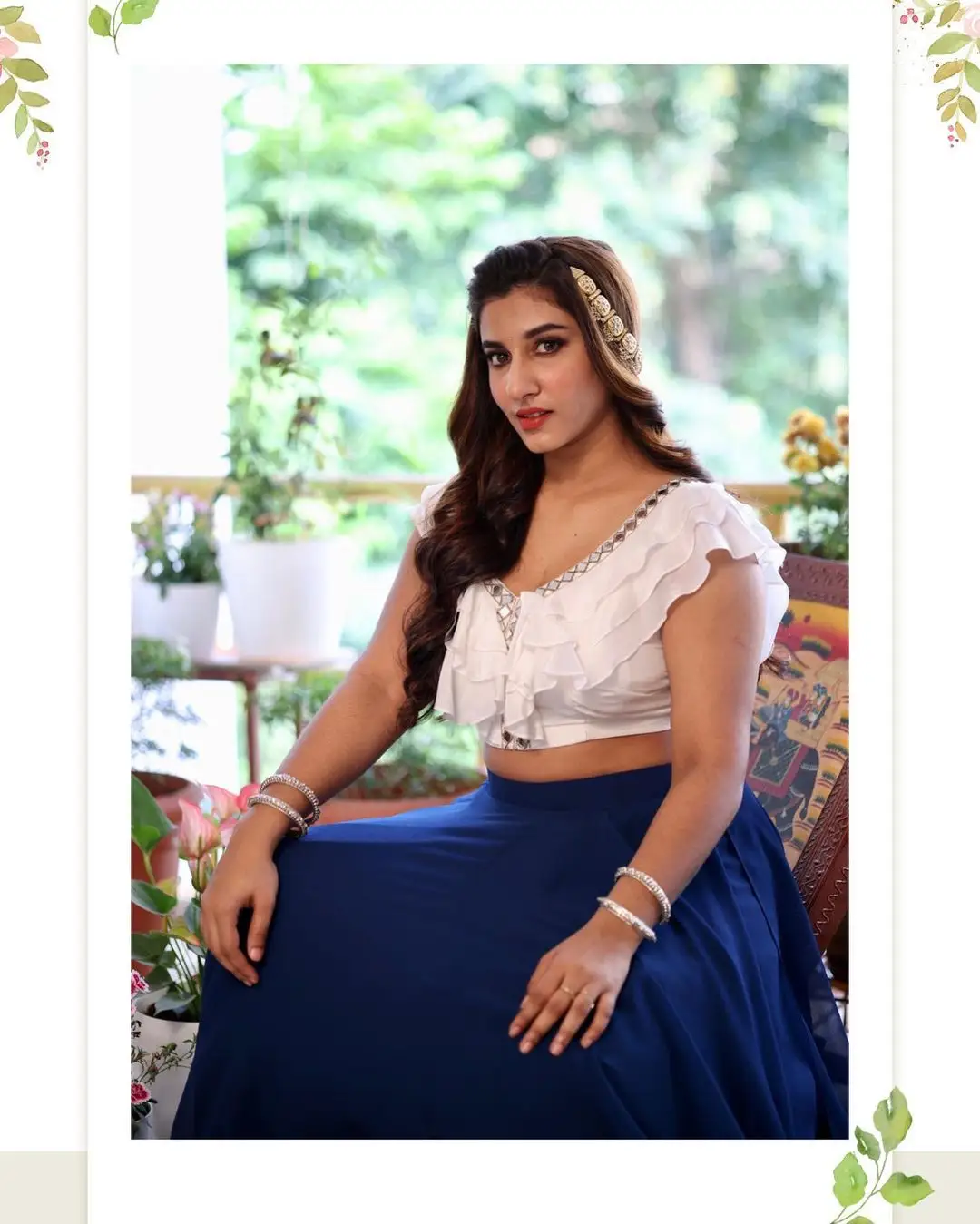 Vishnupriya bloomed in a white & blue dress